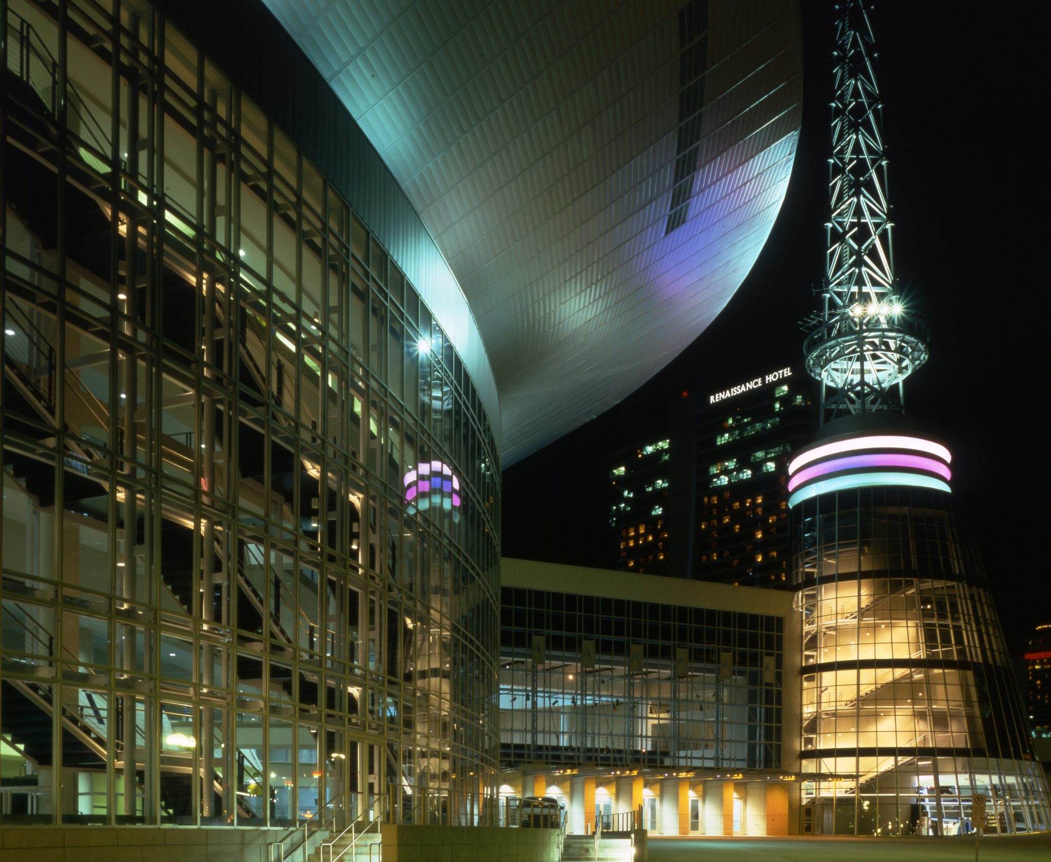 The major walls of the concourse are transparent, revealing sweeping stair elements.