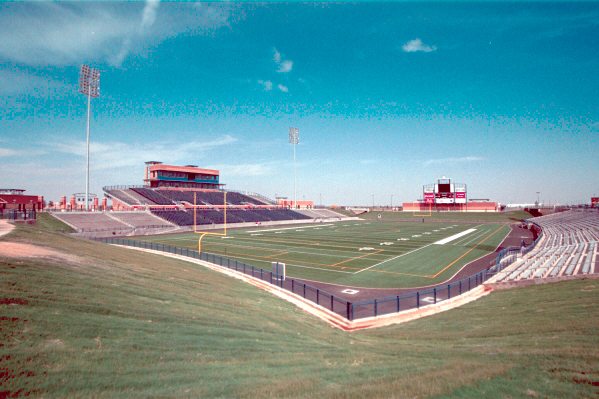 The 15,000-seat facility functions as both a soccer and football stadium.