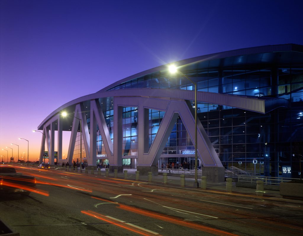 The exterior is elegant & modern with curvilinear steel roof planes.