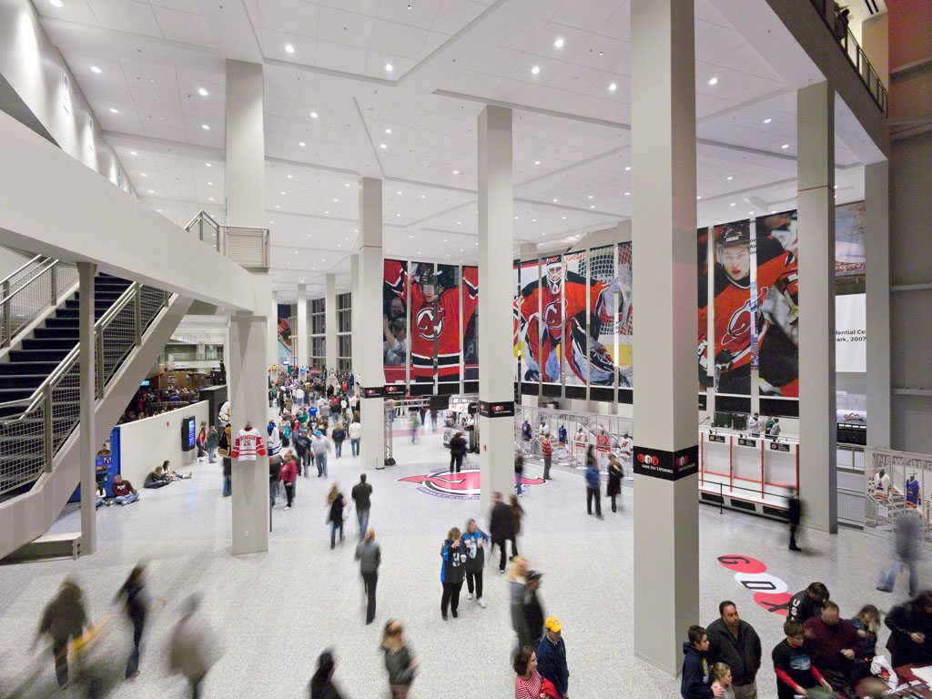 Team-branded spaces are present throughout the arena.