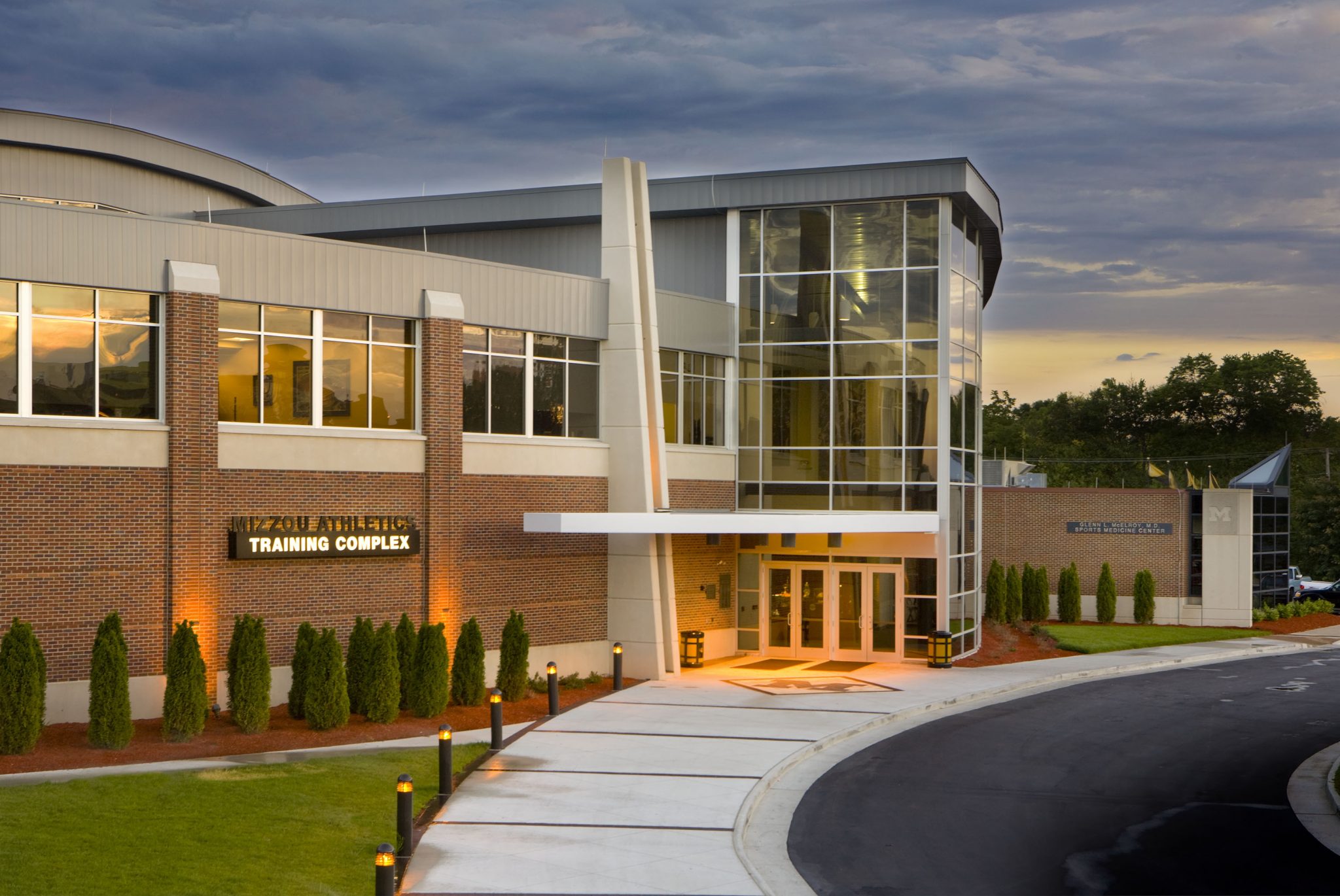 Specific architectural features unify the complex with its campus neighbors.